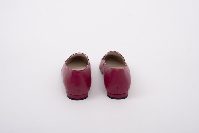 Back shot of womens large sizes flat purple shoe available in sizes 8-12