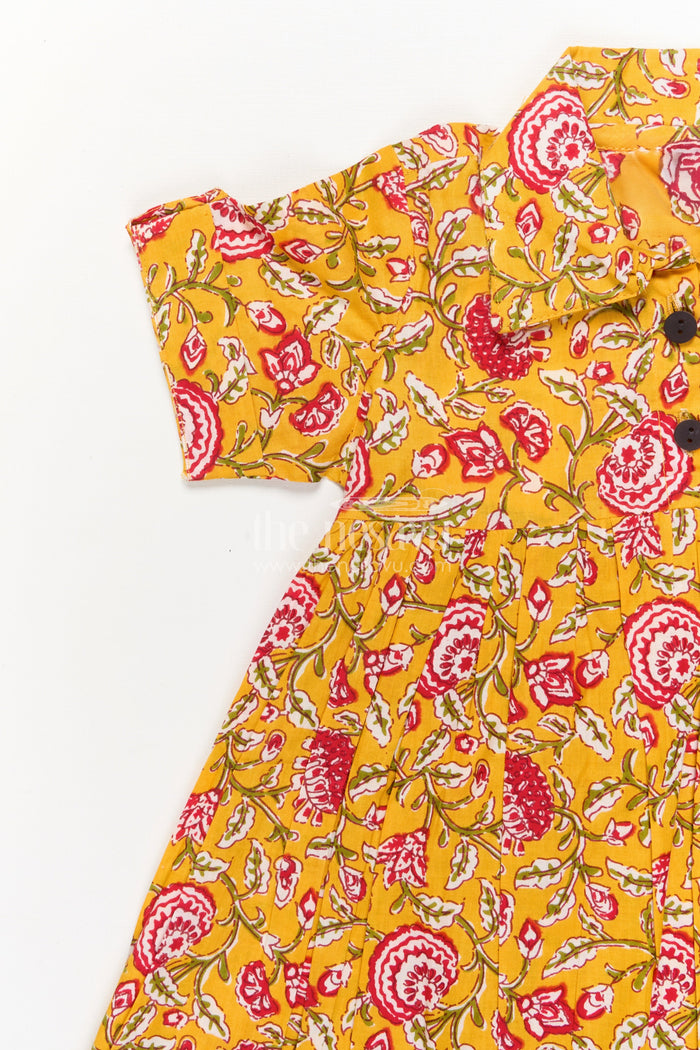 The Nesavu Girls Cotton Frock Baby Girl Cotton Frock for Ethnic Day and Festive School Events Nesavu Nesavu yellow cotton frock for baby girls with collar and floral print – festive and school ethnic wear