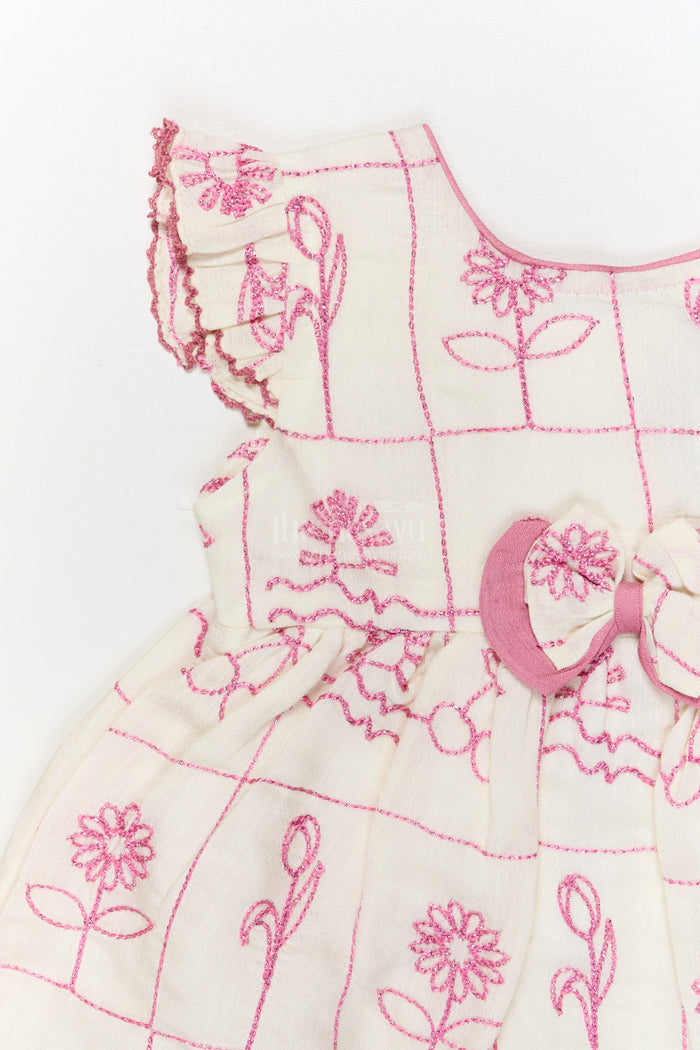The Nesavu Baby Cotton Frocks Baby Girl Cotton Frock with Bow Detail for Casual and Festive Use Nesavu Nesavu baby girl cotton frock with bow and floral thread embroidery for festive or casual wear