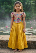 The Nesavu Pattu Pavadai Baby Girl Pattu Pavadai for Naming Ceremony and Festive Photos Nesavu 18 (2Y) / Yellow / Raw Silk GPP393A-18 Nesavu Baby Girl Pattu Pavadai With Paithani Blouse For Festive And Wedding Celebrations