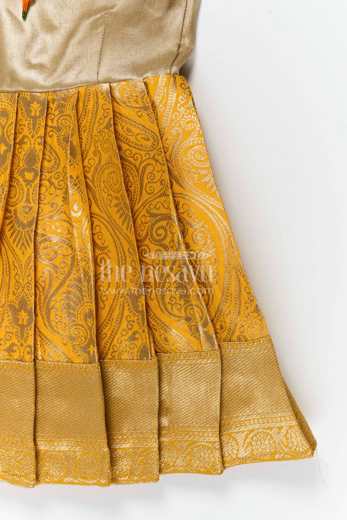 The Nesavu Tie-up Frock Baby Girl Tie up Frock for Festive Wear and Traditional Occasions Nesavu Nesavu baby girl tie up frock for festive wear with semi banaras fabric and tissue yoke flared design