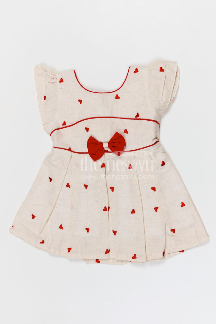 The Nesavu Baby Cotton Frocks Baby Girls Cotton Embroidered Frock with Heart Motifs and Bow Detail Nesavu 14 (6M) / Half white / Cotton BFJ968A-14 Nesavu baby girls cotton embroidered frock with heart design for cute everyday wear