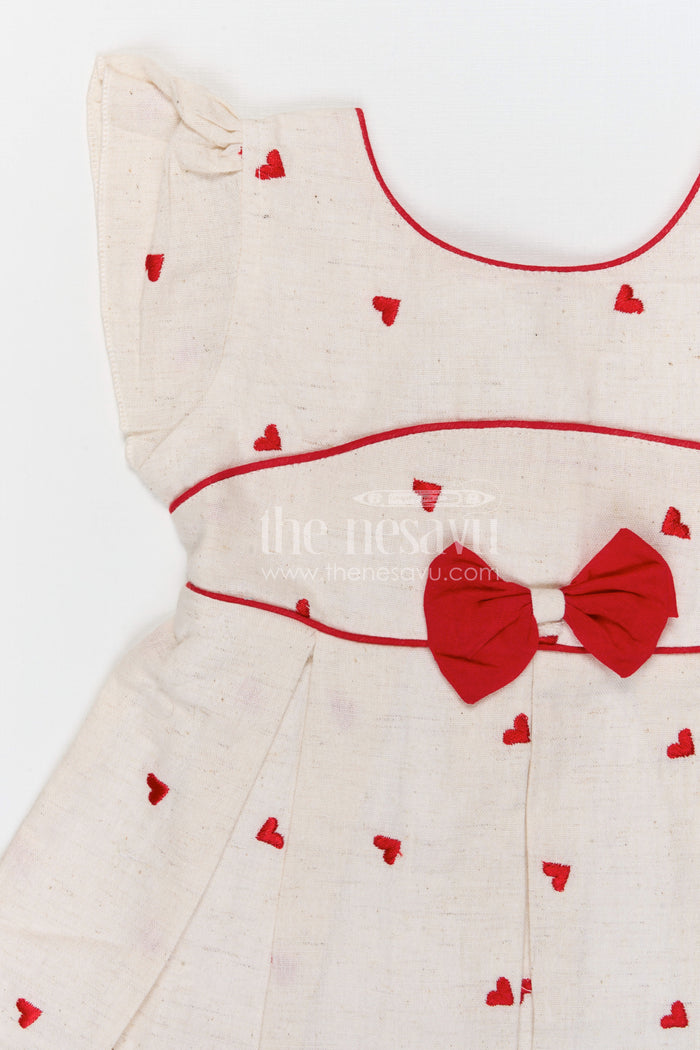 The Nesavu Baby Cotton Frocks Baby Girls Cotton Embroidered Frock with Heart Motifs and Bow Detail Nesavu Nesavu baby girls cotton embroidered frock with heart design for cute everyday wear
