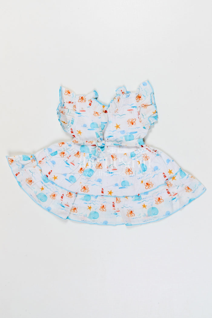 The Nesavu Baby Cotton Frocks Baby Girls Cotton Printed Frock with Cute Ocean Theme Design Nesavu Nesavu baby girls cotton frock with ocean themed digital print for summer wear