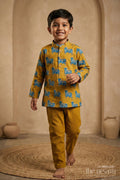 The Nesavu Boys Kurtha Set Boys Cotton Printed Kurta with Traditional Pichwai Motifs and Matching Pants in Mustard Nesavu 12 (3M) / Yellow BES660B-12 Boys Cotton Printed Kurta Traditional Pichwai Motifs Matching Pants | The Nesavu
