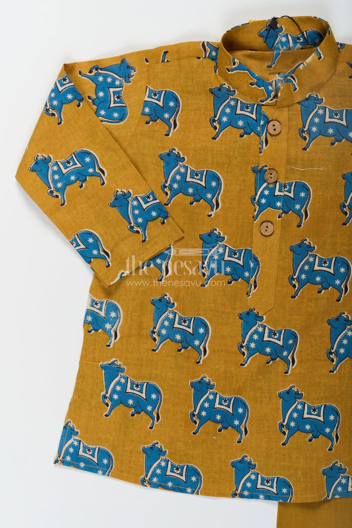The Nesavu Boys Kurtha Set Boys Cotton Printed Kurta with Traditional Pichwai Motifs and Matching Pants in Mustard Nesavu Nesavu Boys Cotton Printed Kurta Traditional Pichwai Motifs Matching Pants