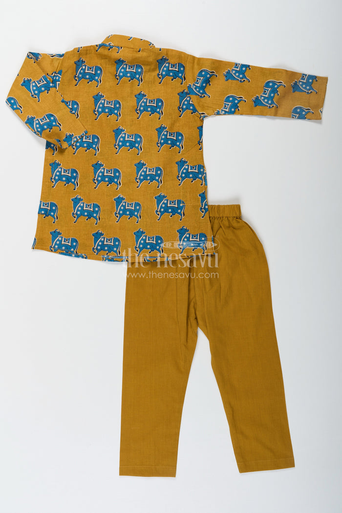 The Nesavu Boys Kurtha Set Boys Cotton Printed Kurta with Traditional Pichwai Motifs and Matching Pants in Mustard Nesavu Nesavu Boys Cotton Printed Kurta Traditional Pichwai Motifs Matching Pants