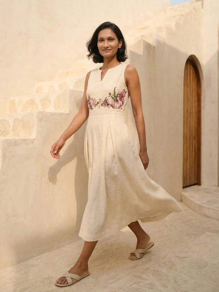 Front view of Celia Linen Midi dress for women in cream with hand-embroidered floral cross-stitch – sleeveless summer A-line midi dress