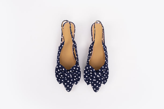 Aerial shot of womens navy polka dot bow slingback kitten teen in larger sizes 8-12