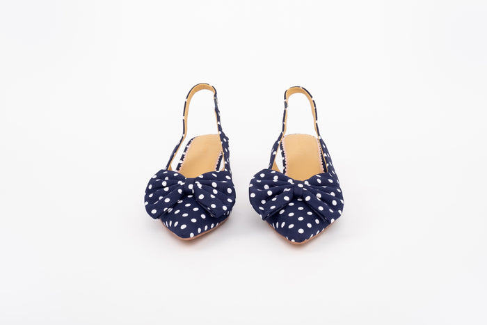 Front shot of navy womens polkadot bow slingback heel available in larger sizes