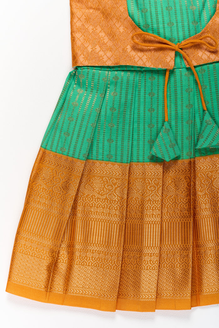 The Nesavu Girls Kanchi Silk Frock Elegant Green and Gold Pattu Full Frock for Girls with Traditional Zari Weaving Nesavu Nesavu Elegant Green Gold Pattu Full Frock Girls Traditional Zari Weaving