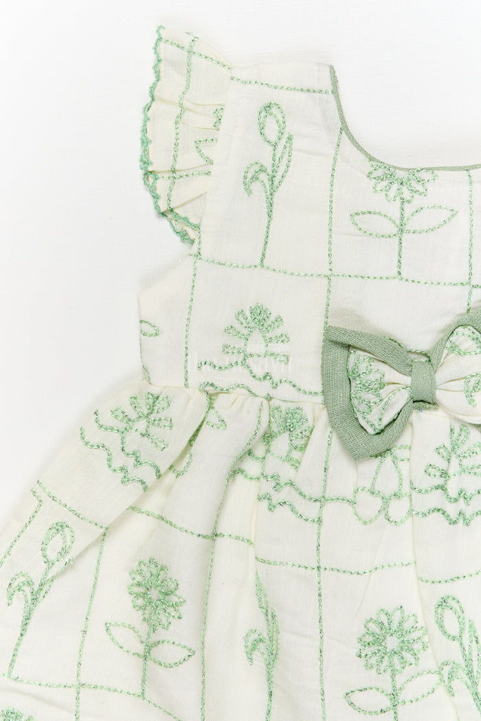 The Nesavu Baby Cotton Frocks Embroidered Cotton Frock for Baby Girls with Classic Bow Accent Nesavu Nesavu cotton blend frock with floral embroidery and ruffle sleeves for baby girls