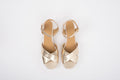 Aerial shot of womens large size gold block heeled sandal in sizes 8 9 10 11 12