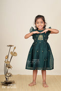 The Nesavu Girls Chanderi Frock Girls Chanderi Cotton New Design Frock with Gold Thread Embroidery and Frilled Sleeves in Deep Green Nesavu 16 (1Y) / Green GFC997AB-16 Nesavu Girls Chanderi Cotton Frock Floral Thread Embroidery Frilled Sleeves Everyday Elegance