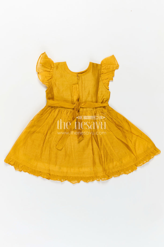 The Nesavu Girls Chanderi Frock Girls Chanderi Cotton Simple Frock Design with Swing Embroidery and Frill Sleeves in Honey Yellow Nesavu Nesavu Girls Chanderi Cotton Honey Yellow Frock Swing Motif Simple Frill Sleeve Design