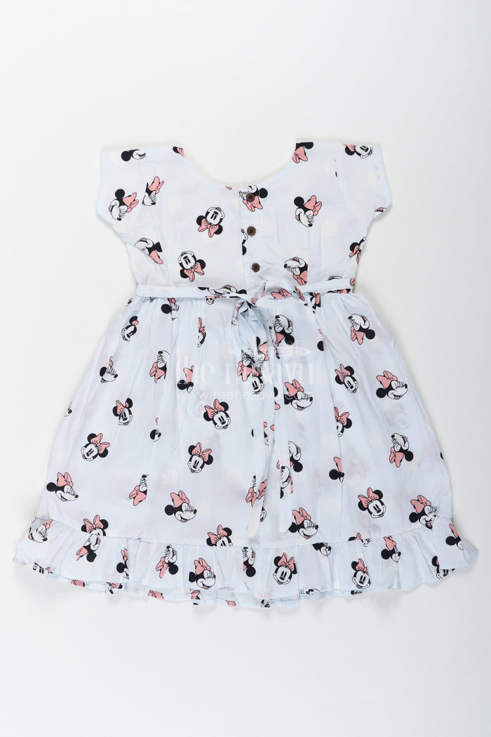 The Nesavu Girls Cotton Frock Girls Cotton White Frock for Eid with Minnie Mouse Digital Print and Ruffled Hem for a Festive Fun Look Nesavu Nesavu Girls White Frock Eid Soft Cotton Minnie Mouse Digital Print Frill Hem Design