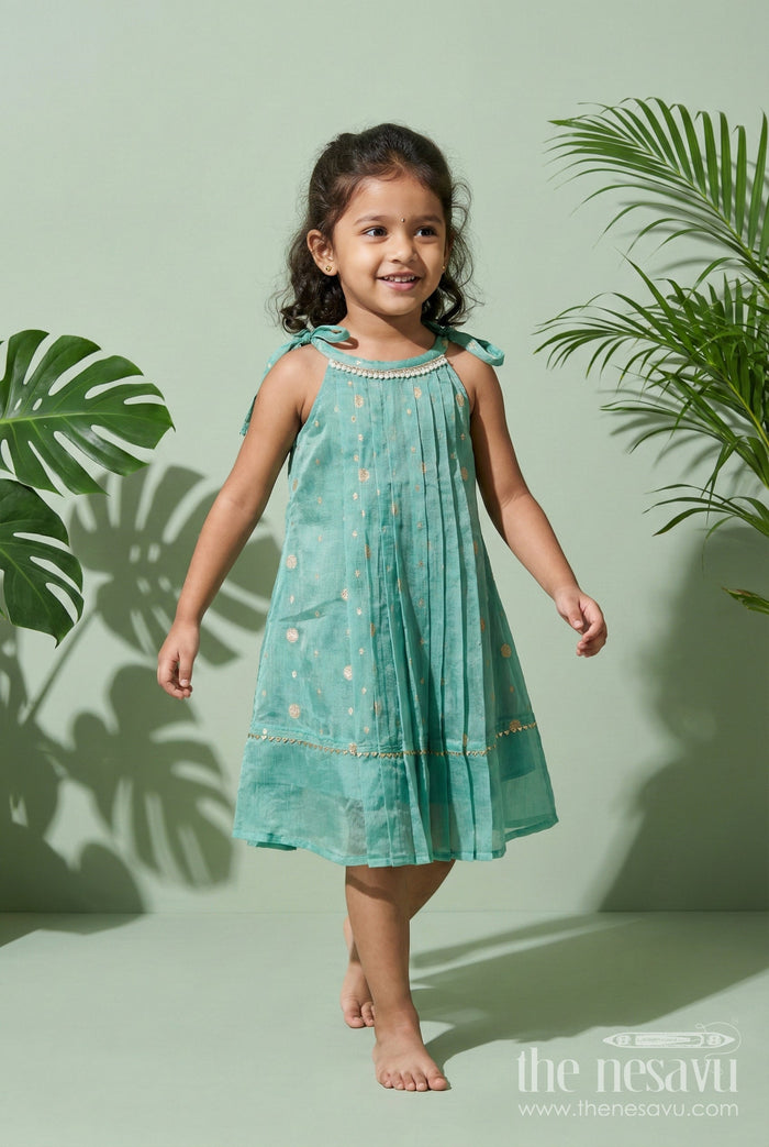 The Nesavu Girls Cotton Frock Girls Ethnic Frock for Pooja, Navaratri and Festive Occasions Nesavu 22 (4Y) / Teal / Silk Blend GFC2066B-22 Nesavu girls tissue silk frock with tie-up straps for Navaratri and festive occasions
