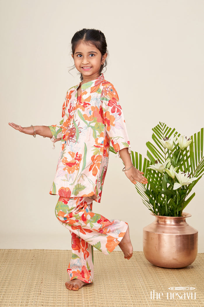 The Nesavu Girls Sharara / Plazo Set Girls ethnic sharara set with bright floral prints for festive comfort Nesavu Nesavu girls cotton floral sharara kurta set  festive ethnic wear summer