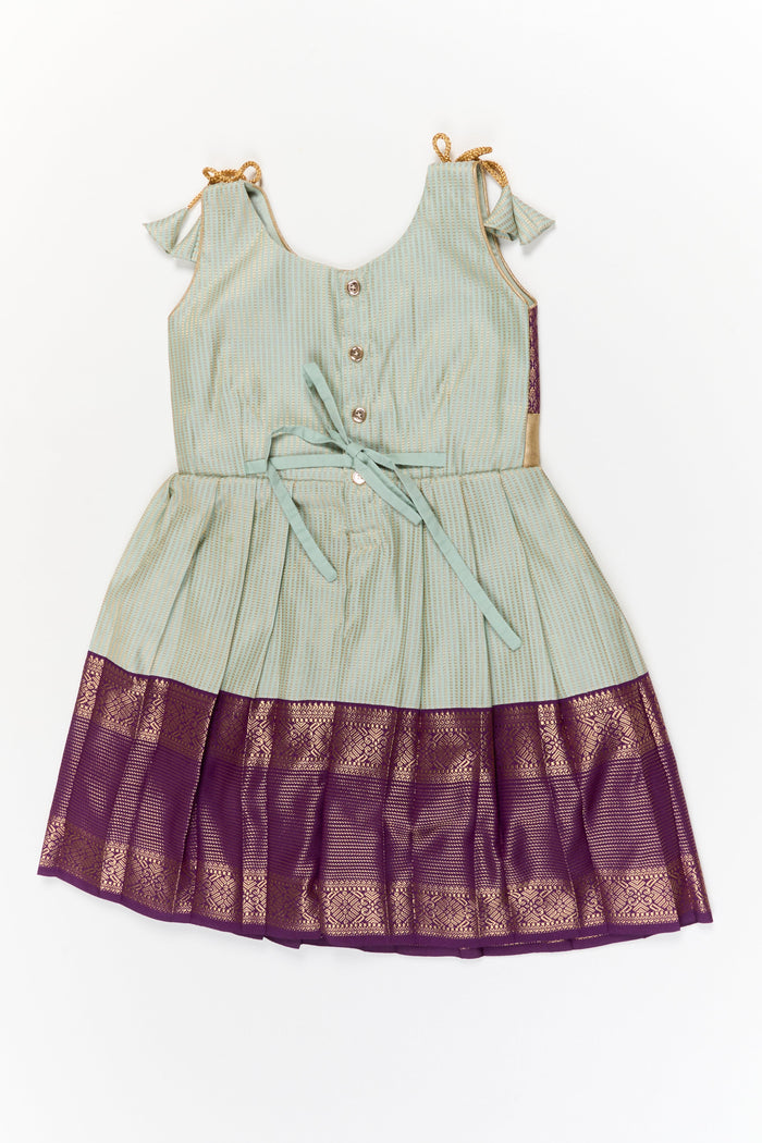 The Nesavu Girls Kanchi Silk Frock Girls Kanchi Silk Frock for Weddings and Traditional Events Nesavu Nesavu girls kanchi silk frock for weddings in semi jacquard kanchivaram silk inspired design