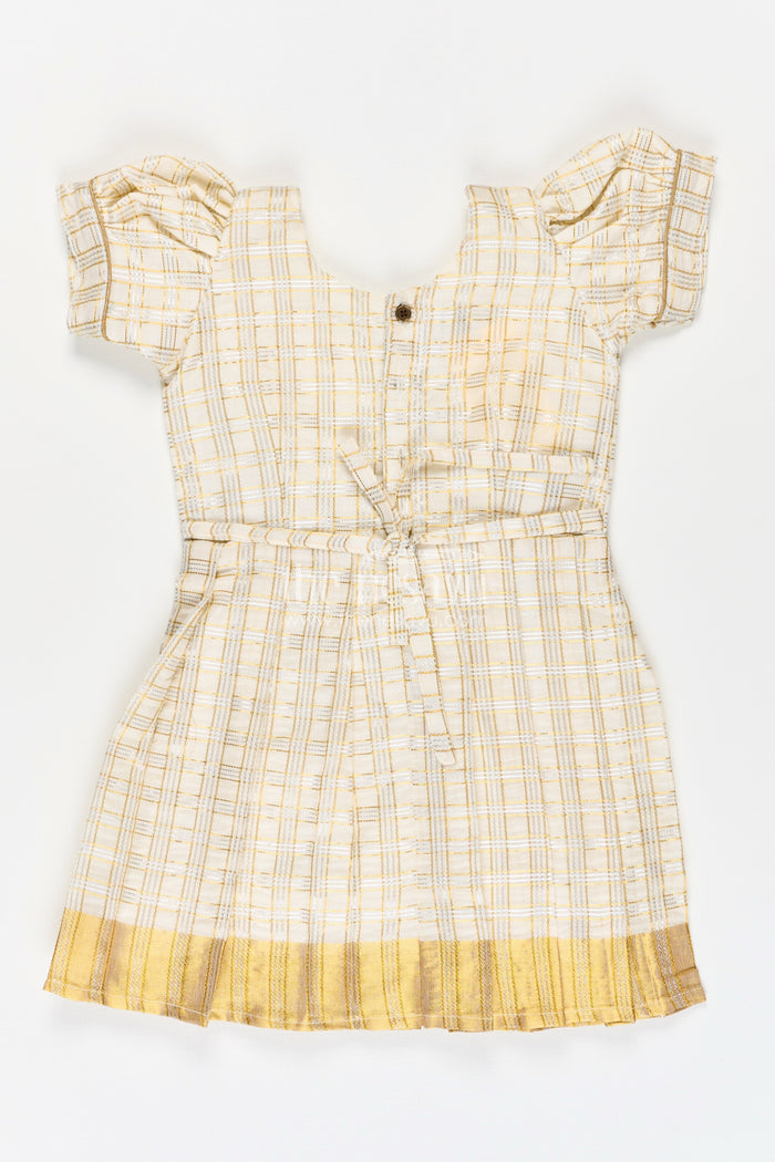 The Nesavu Silk Frock Girls Long Frock Dress in Beige Silk with Bow Accent and Golden Checked Pattern Nesavu Nesavu Girls Long Frock Dress Checked Beige Silk Golden Bow Pleated Finish