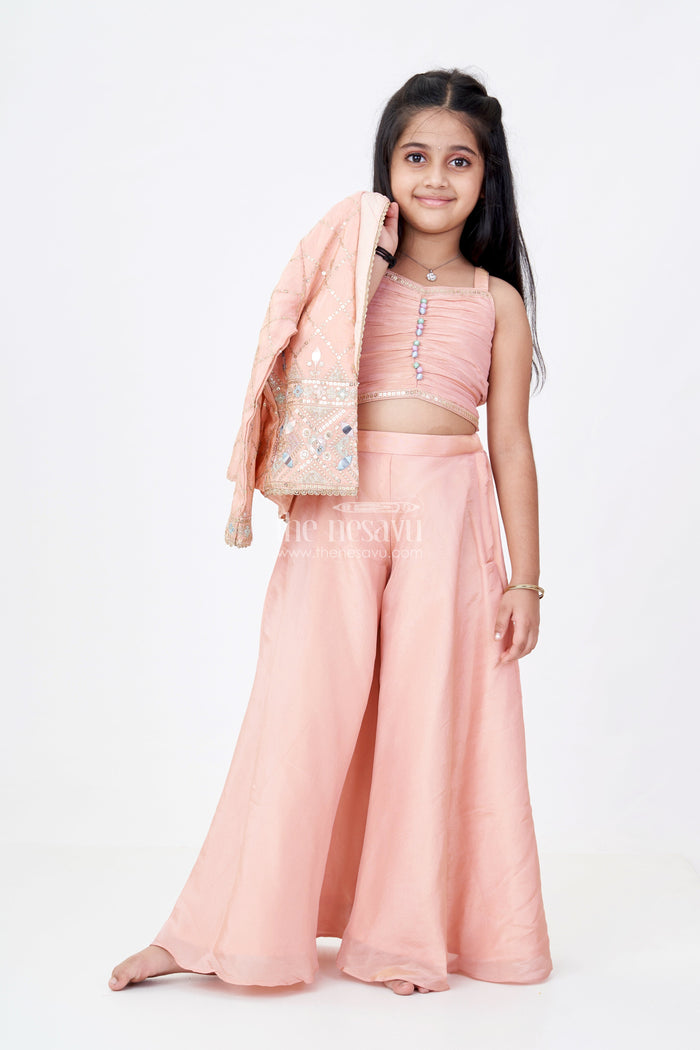 The Nesavu Girls Sharara / Plazo Set Girls Sharara Plazo Set with Embellished Jacket and Flowy Pants in Peach Nesavu Nesavu Girls Peach Sharara Plazo Set Embellished Jacket Flowy Pants