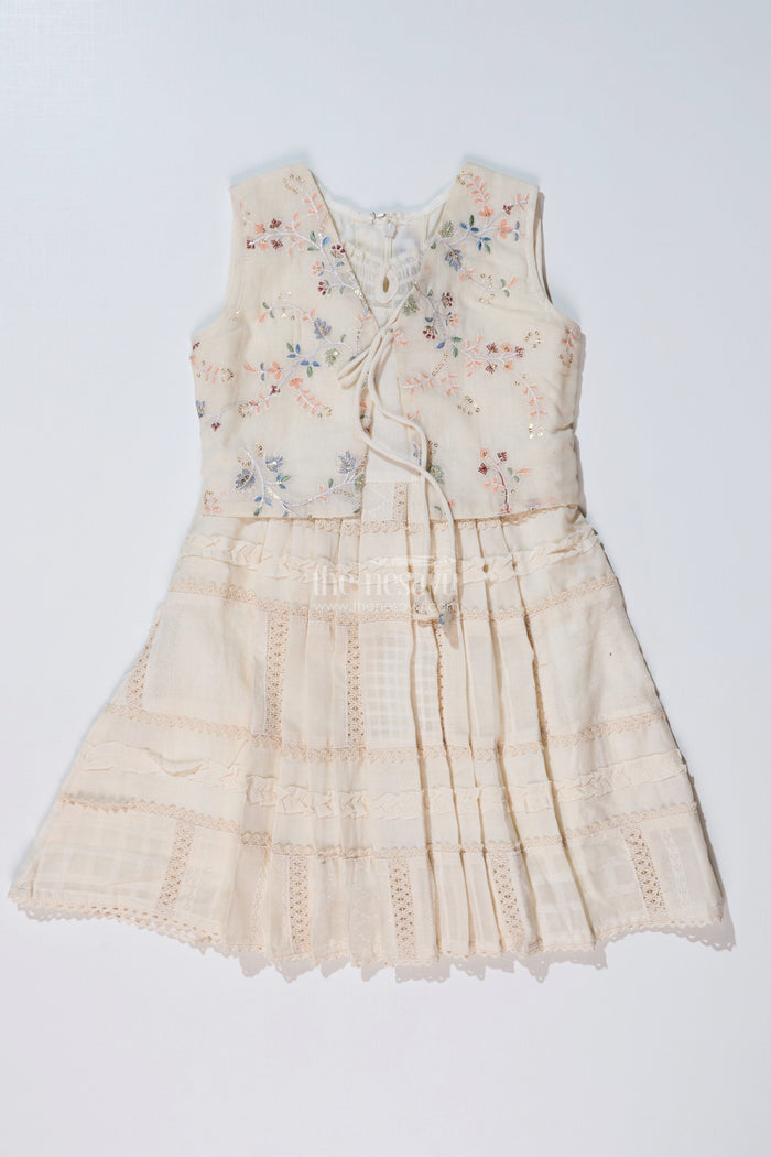 The Nesavu Girls Cotton Frock Girls White Color Frock with Embroidery and Layered Pleats for Graceful Festive Wear Nesavu Nesavu Girls White Color Cotton Frock Embroidery Layered Pleats Festive Wear