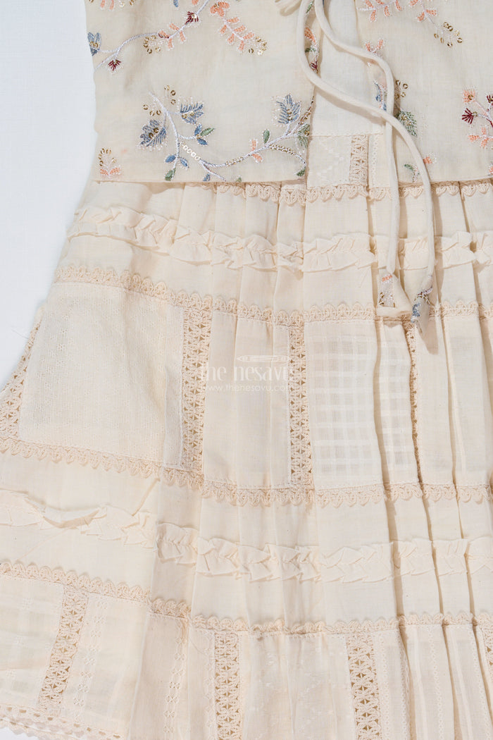 The Nesavu Girls Cotton Frock Girls White Color Frock with Embroidery and Layered Pleats for Graceful Festive Wear Nesavu Nesavu Girls White Color Cotton Frock Embroidery Layered Pleats Festive Wear