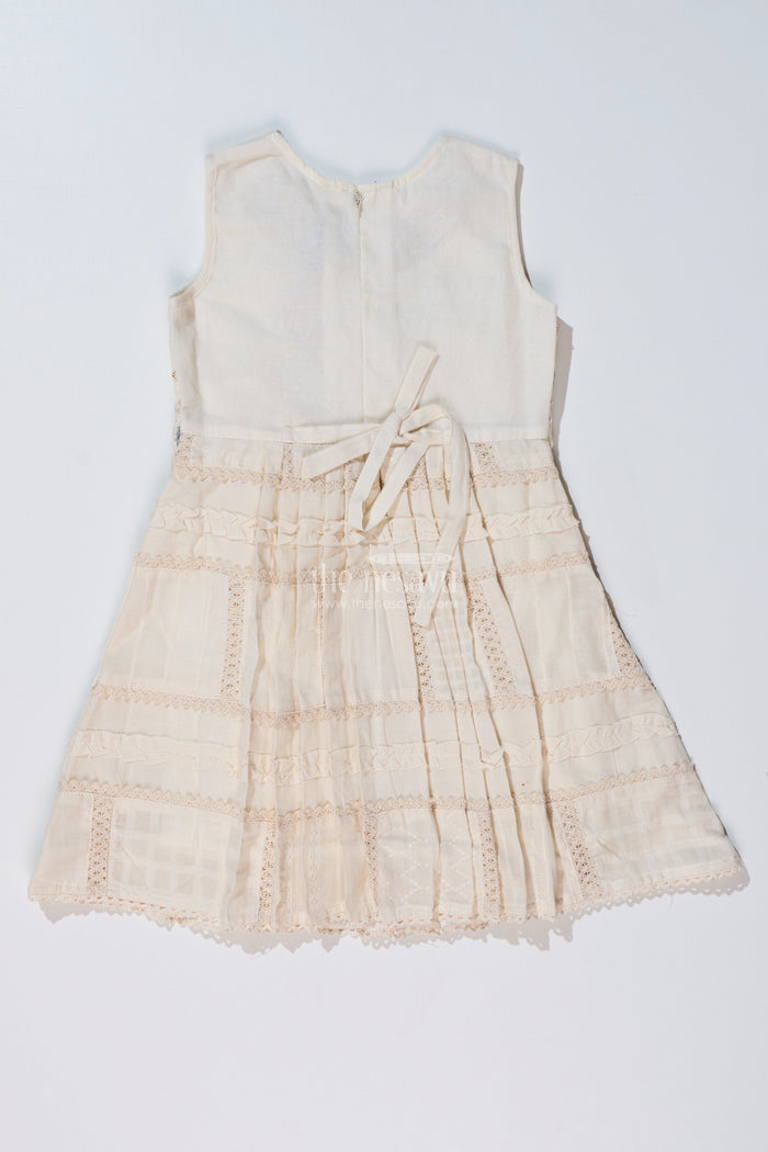 The Nesavu Girls Cotton Frock Girls White Color Frock with Embroidery and Layered Pleats for Graceful Festive Wear Nesavu Nesavu Girls White Color Cotton Frock Embroidery Layered Pleats Festive Wear