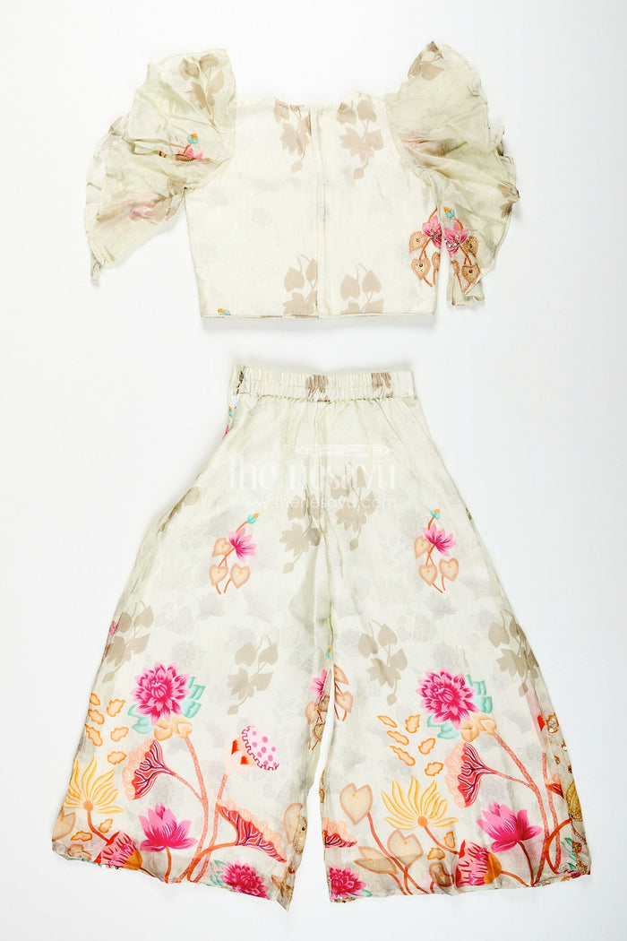 The Nesavu Girls white floral sharara set with puff sleeve blouse for birthdays and events Nesavu Nesavu girls white floral printed sharara set puff sleeve top  perfect festive birthdays family functions