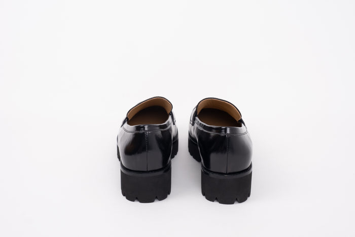 back shot of womens black leather chunky large size loafer in sizes 42-46