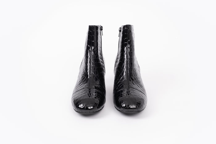 Izzy Boot by Otto + Ivy - a front profile of a black boot for tall women with large feet, featuring glossy black croc leather and a low chunky heel.