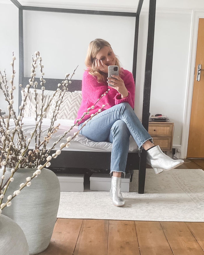 Izzy Boot by Otto + Ivy - a silver boot for tall women with large feet, featuring silver leather and a low chunky heel, worn with jeans and a pink jumper