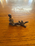 Lead Black Americana boy with squirrel