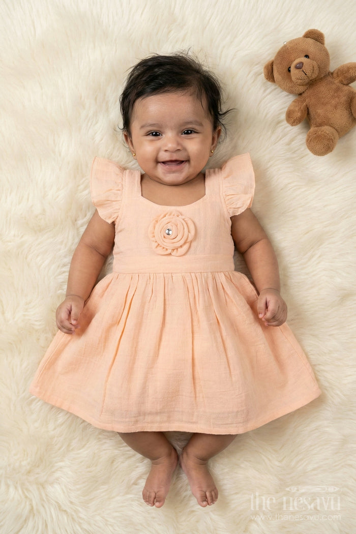 The Nesavu Girls Cotton Frock Muslin Cotton Frock for Baby Girls’ Everyday Comfort Nesavu 14 (6M) / Orange / Muslin Cotton BFJ917B-14 Nesavu muslin cotton baby frock for everyday wear with ruffle sleeves and floral applique