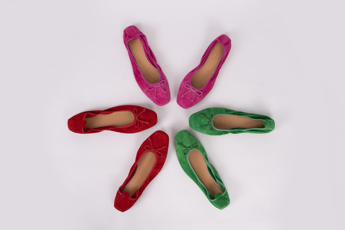 Aerial view of Olivia flats in 3 different colours, red, green and fuchsia. Available in larger sizes for women. European 42-46.