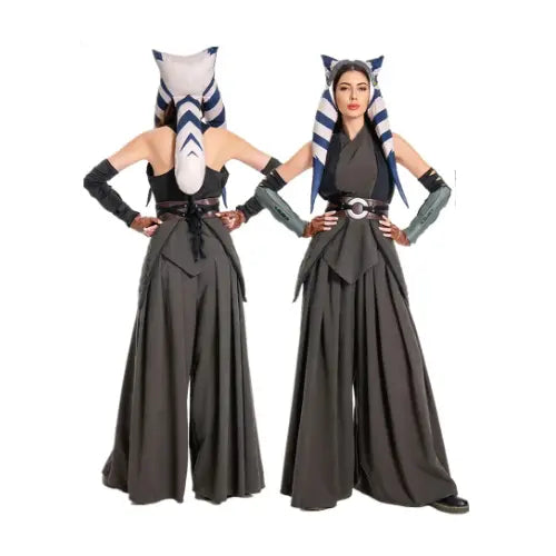 Two people in Ahsoka Tano costumes from 'Star Wars' on a white background