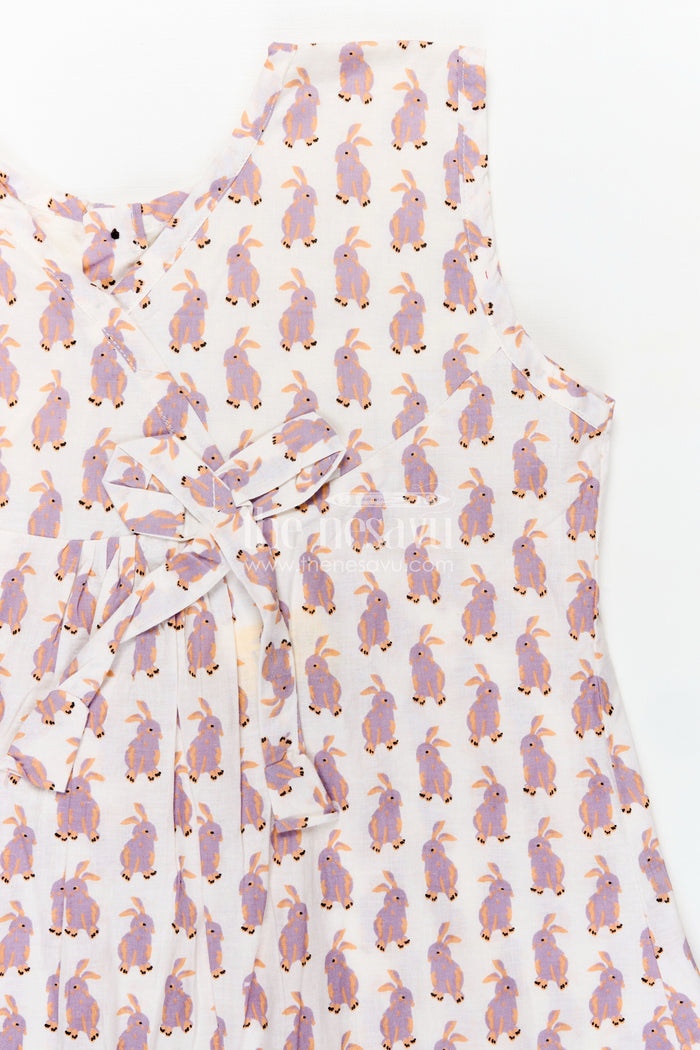The Nesavu Girls Cotton Frock Soft Cotton Frock for Girls with Hand Block Bunny Print and Elegant Frill Edges in Off White Nesavu Nesavu Girls Soft Cotton Frock Hand Block Bunny Print Frilled Hem Creamy White