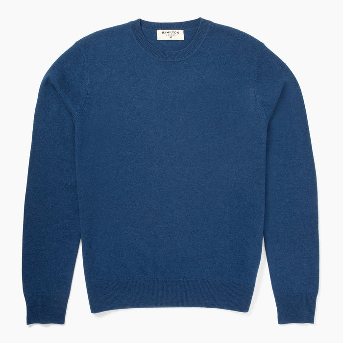 Blue sweater on a white background