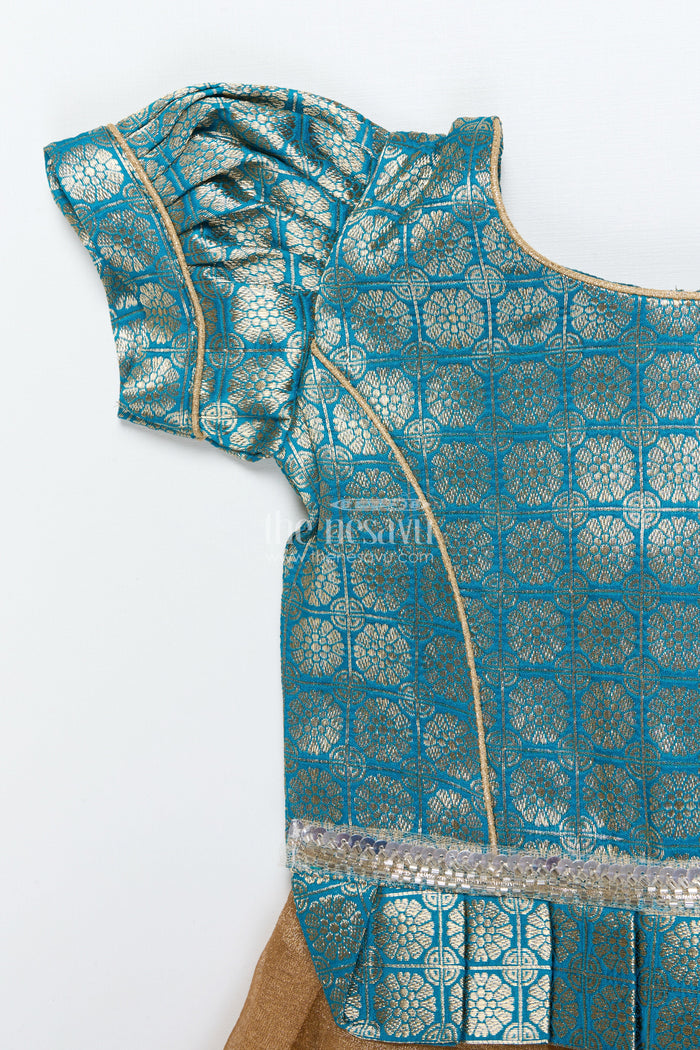 The Nesavu Pattu Pavadai Toddler Girl Tissue Silk Pattu Pavadai with Brocade Blouse and Golden Skirt Nesavu Nesavu toddler girl tissue silk pattu pavadai with brocade blouse for weddings and celebrations