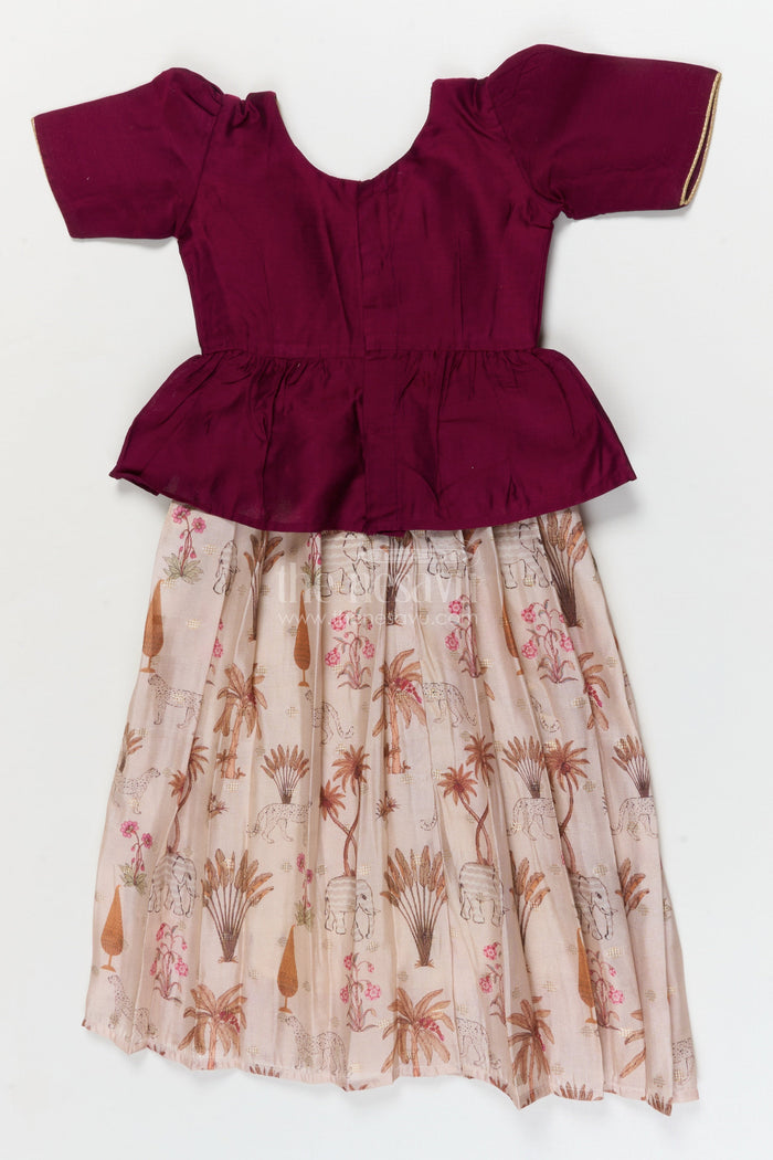 The Nesavu Pattu Pavadai Traditional Wrap-style Baby Pattu Pavadai for Festive Milestones Nesavu Nesavu wrap-style baby pattu pavadai with jungle print skirt for traditional festivities