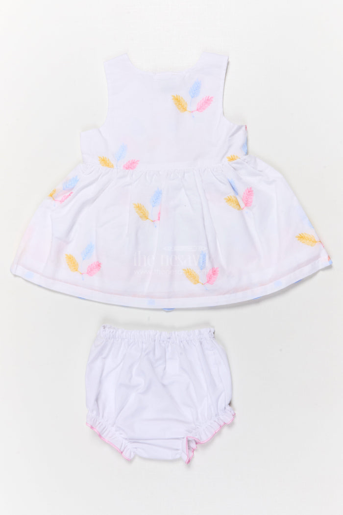 The Nesavu Baby Cotton Frocks Two-piece Baby Frock Set with Floral Embroidery and Bloomers Nesavu Baby frock set with embroidery and bloomers for comfortable everyday wear
