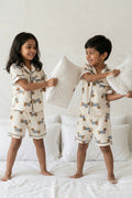 The Nesavu Night Dress Unisex Kids Cotton Night Suit with Dog Print for Cozy Sleep Nesavu 16 (1Y) / Cream / Muslin Cotton NS055A-16 Nesavu Unisex Kids Muslin Cotton Dog Print Night Suit For Comfortable Summer Sleepwear