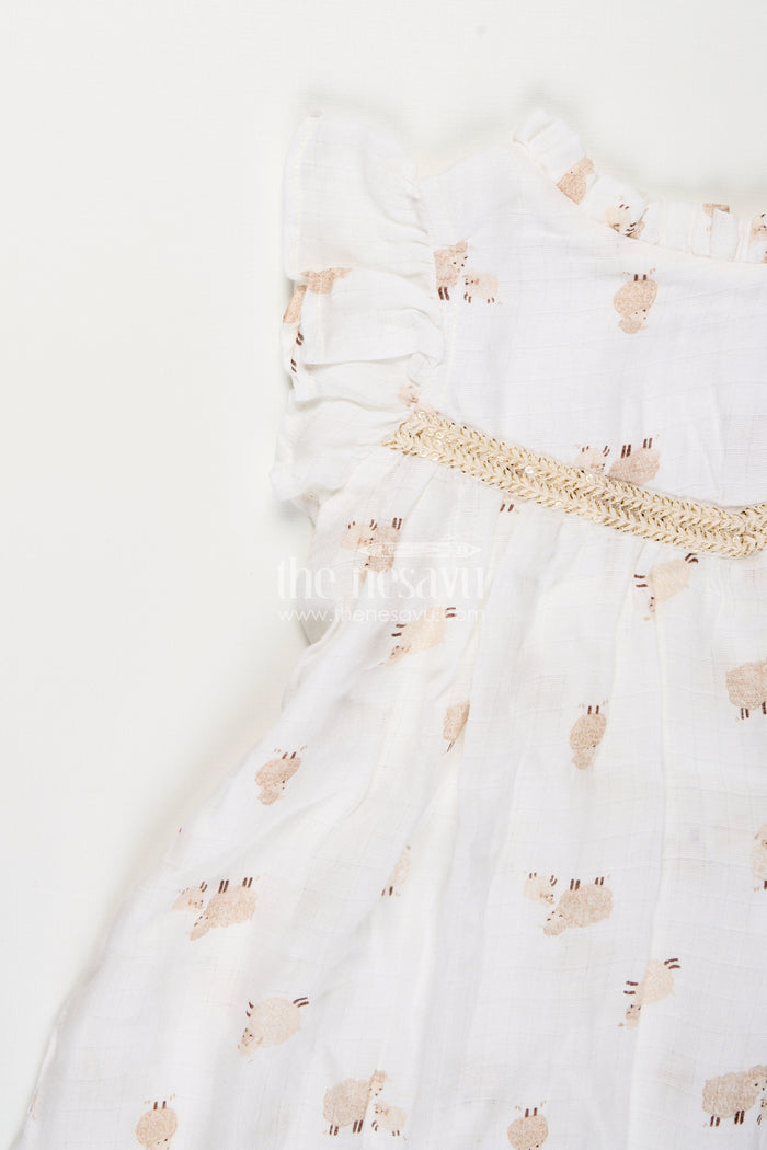 The Nesavu Girls Cotton Frock White Muslin Cotton Frock for Baby Girls with Soft Sheep Print Nesavu Nesavu baby girls white muslin cotton frock with sheep print and ruffle detailing for everyday wear