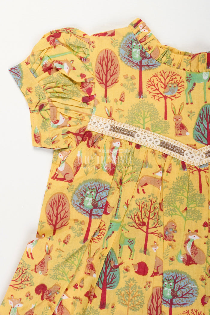 The Nesavu Girls Cotton Frock Woodland Animal Print Cotton Frock for Toddler Girls Nesavu Nesavu yellow cotton frock for toddler girls with woodland animal print and frill detailing