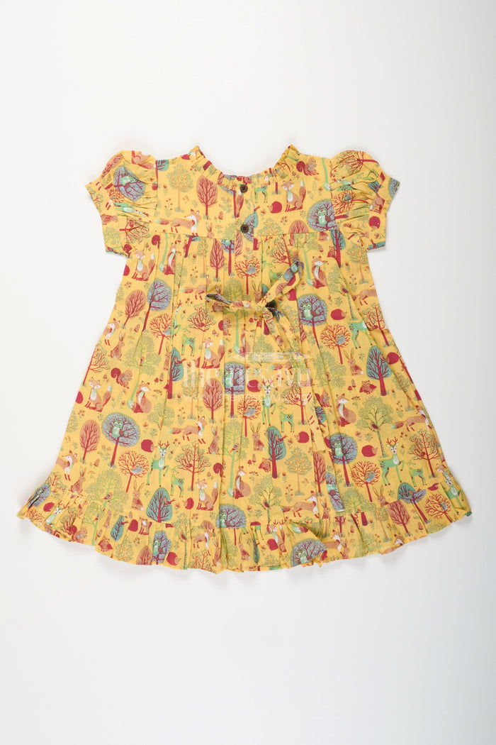 The Nesavu Girls Cotton Frock Woodland Animal Print Cotton Frock for Toddler Girls Nesavu Nesavu yellow cotton frock for toddler girls with woodland animal print and frill detailing